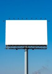Obraz premium Outdoor Billboard Against A Blue Sky Advertising Display Photo