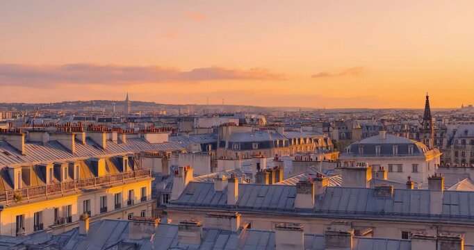 Romantic Rooftop View of Parisian Buildings at Sunset in Warm Light