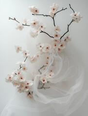 elegant ikebana arrangement, which is a traditional Japanese art form of flower arranging. 