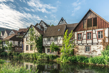 Half-timbered houses along the banks of the Kinzig River, Schiltach, Baden-Wuerttemberg, Germany