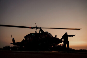 helicopter at sunset