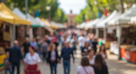 Obraz premium Photo of Busy Outdoor Market with People Walking and Interacting During Daytime