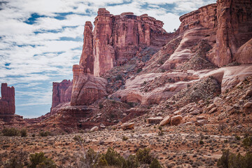 Sandstone cliff and textured slope in Arches National Park, Utah