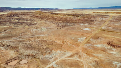 Aerial view of Cisco, Utah's desert ridge and layered rock formations