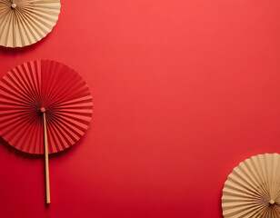 Chinese New Year celebration. Banner design with red paper fan decorations on a red background. A new year celebration.  Red Chinese fan on a wooden background,
