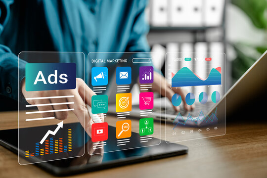 Businesswoman using digital marketing and online advertising dashboard with marketing strategy icons, analytics data, and SEO tools on screen interface for business growth and campaign performance. - Powered by Adobe