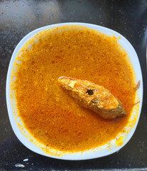 Indian Pomfret Fish Curry on Plate – Spicy Coastal Dish