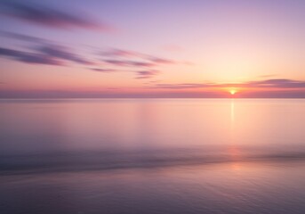 Naklejka premium Photo of Sunset over Ocean with Pink and Purple Hues and Calm Water