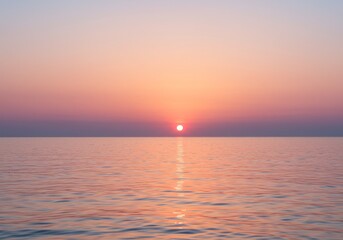 Obraz premium Photo of Sunset Over the Ocean with Orange and Pink Hues and Calm Water