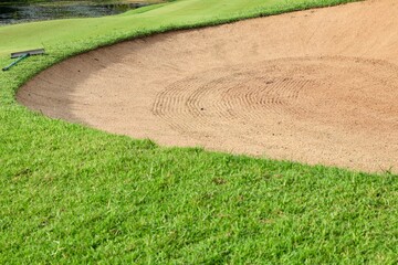Golf Course Sand Pit Bunkers, green grass surrounding the beautiful sand holes is one of the most challenging obstacles for golfers and adds to the beauty of the golf course