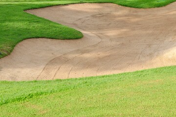 Golf Course Sand Pit Bunkers, green grass surrounding the beautiful sand holes is one of the most challenging obstacles for golfers and adds to the beauty of the golf course