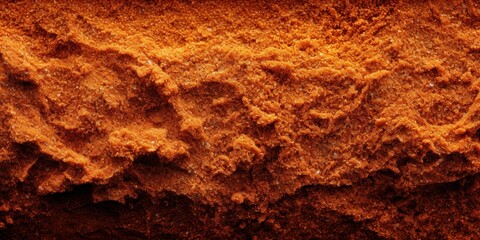 Textura abstracta anaranjada, superficie rugosa y terrosa