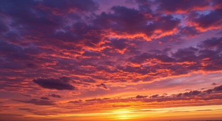 Obraz premium Photo of Fiery Sunset Sky with Red Orange and Purple Clouds Background