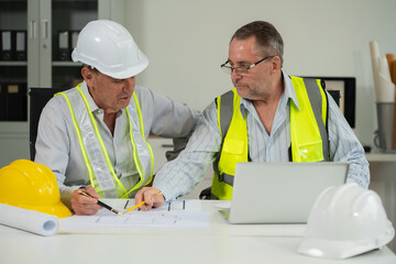 Architect construction engineer plan on hard project at work.