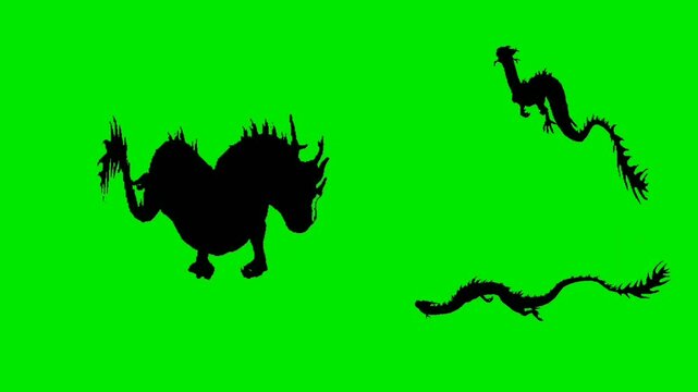 Silhouettes of drogen flying on green screen 