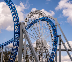 Ferris wheel with slides in an amusement park.
