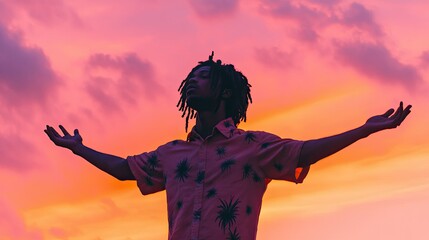 A silhouetted young man with stylish dreadlocks, wearing a black T-shirt, stands against a softly gradient pastel background.