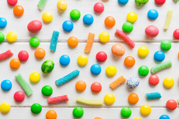 colorful candies as background top view. Seamless pattern with candy. Many sweet candies close-up