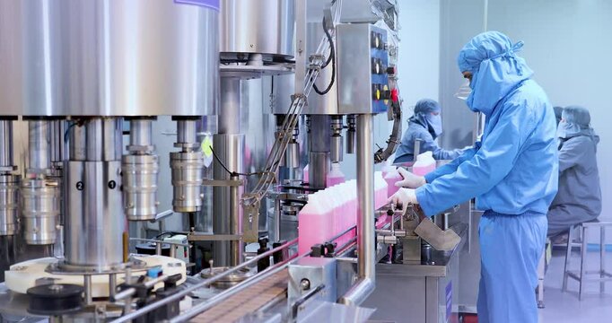 Pharmaceutical manufacturing line for liquid medicine production, automatic bottle filling machine for syrup, sanitizer, or gel in plastic bottles at sterile industrial packaging facility	