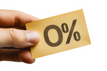 Hand holding a yellow card showing zero percent