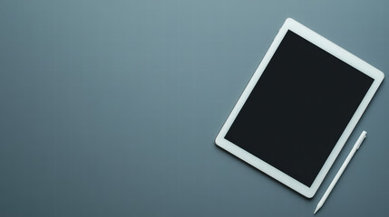 Digital Canvas: An empty tablet and stylus sit on a minimalist, monochromatic surface, ready to receive ideas. Evoking a sense of creative potential and technological advancement.