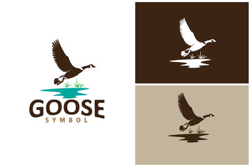 Flying Goose over the River Creek lake grass silhouette nature wildlife logo vector design