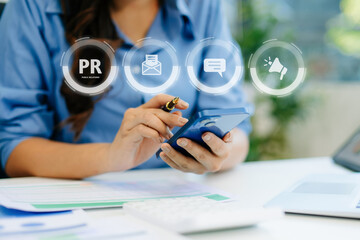 PR, Public relations concept. woman hands using laptop and tablet with public relations icon for communication advertising marketing strategy.