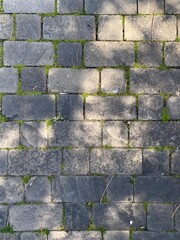 Background of city road with cobblestone top view