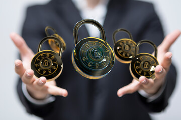 Image of combination locks floating above hands, symbolizing data security and protection.