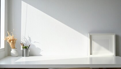 Clean white desk, bright sun, simple decor