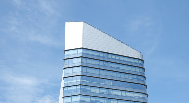 Modern glass mixed-use building The Parq soars into blue sky in Thai capital Bangkok