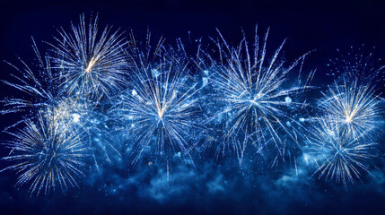 Fireworks brighten the dark night sky creating a festive atmosphere for celebrations and events