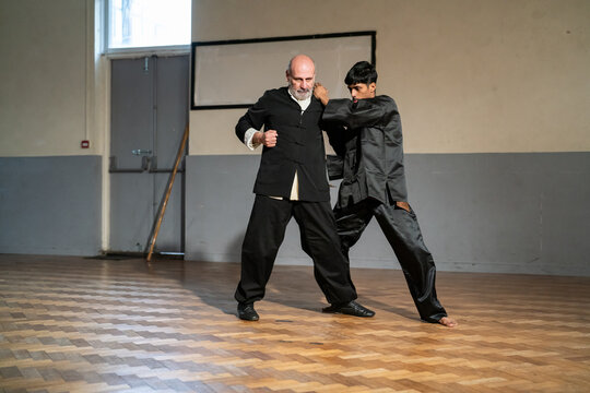 Man performing during Kung Fu Black Belt test
