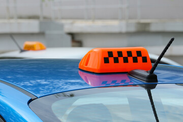 Taxi Light on Roof of Car.