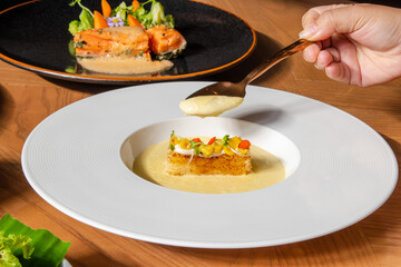 Fine Dining Cream Soup with Gourmet Garnish on White Plate
