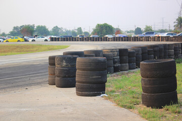 Used car tires pile on the race track.