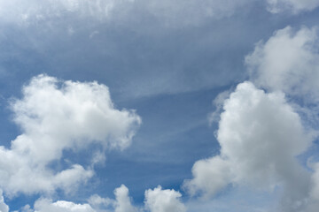 Beautiful Fluffy Clouds in a Bright Blue Sky