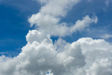 Cloudy Sky with Fluffy White Cumulus Clouds