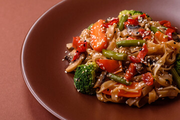 Chinese or Thai food, rice noodles with meat, salt and spices. Asian food