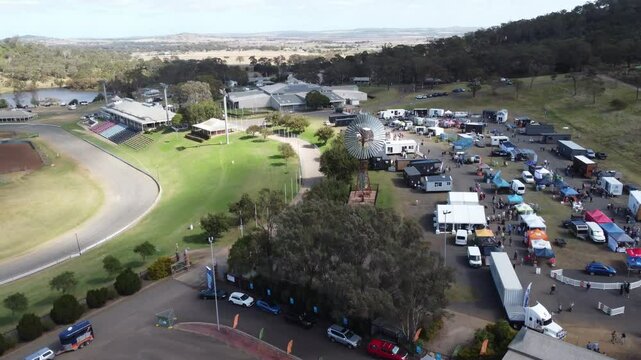 4K aerial view of a Showgrounds with a Tiny Homes Expo being held in a regional town in Australia