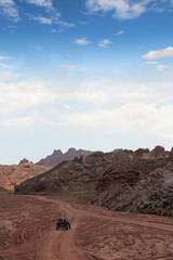 Quad bike adventure through the Pingshan Hu Grand Canyon in summer, Zhangye City, Gansu Province in China
