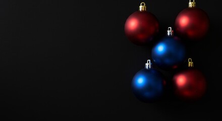 Fototapeta premium Festive Christmas Ornaments in Red and Blue on Black Background Photo