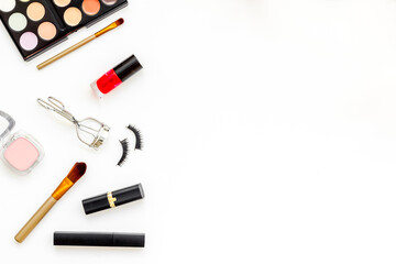Makeup tools and cosmetics products, top view