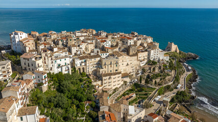 Obraz premium Aerial view of the historic center of the town of Sperlonga, in the province of Latina, Lazio, Italy. The houses and buildings of the city overlook the Mediterranean Sea.
