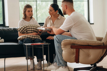 Issues solving, helping. Mother with her daughter are at psychologist appointment