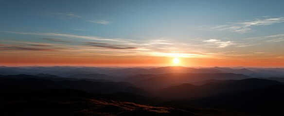 Obraz premium The breathtaking sunset over majestic mountains and serene landscapes.