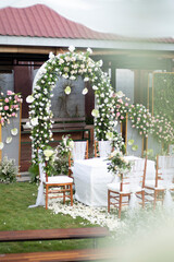 christmas tree in front of a house