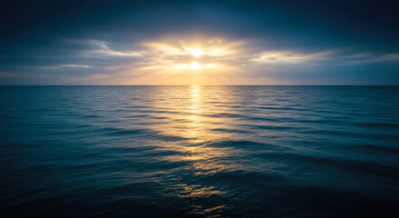 Obraz premium Serene Ocean Sunset Dramatic Golden Rays Peaceful Water Horizon