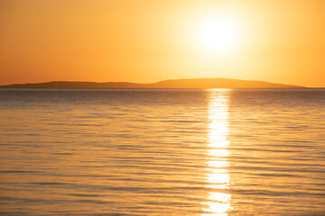 Sunset on the coast of the Sea of Azov in Crimea