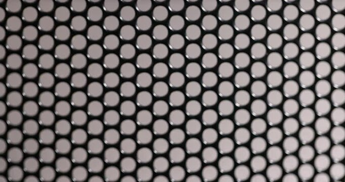 a mesh to protect electrical appliances , a metal mesh with small holes to protect and provide ventilation.